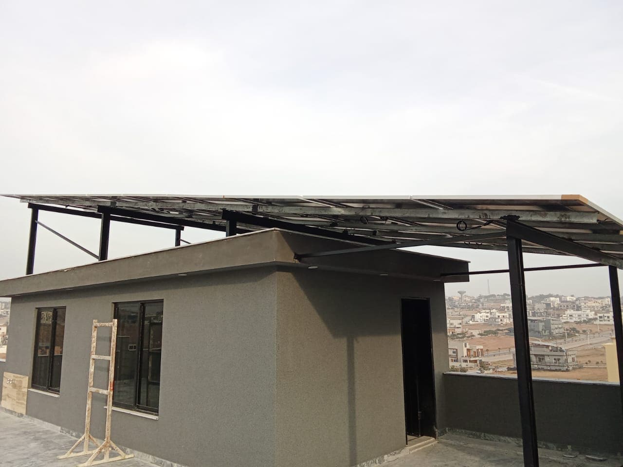 Solar panels installed on a shed roof structure